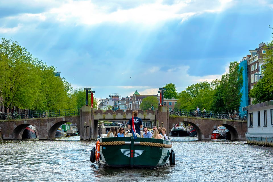Amsterdam: The Newest Canal Cruise with Drink Option - Weather in Amsterdam: Dress for Shifts, Then Enjoy the Coziness