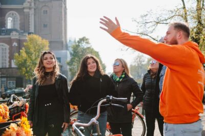 Amsterdam: Top Highlights Guided Bike Tour EN/DE/ES/FR/IT/CN - The 12-Stop Route: Jordaan Lanes, Anne Frank Area, and Canal Belt Views
