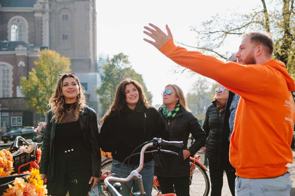 Amsterdam: Top Highlights Guided Bike Tour EN/DE/ES/FR/IT/CN - The 12-Stop Route: Jordaan Lanes, Anne Frank Area, and Canal Belt Views