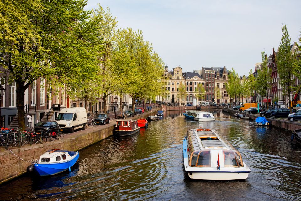 Amsterdam Walking Tour and Canal Cruise - Dam Square, West Church, and the museum area—without the overwhelm