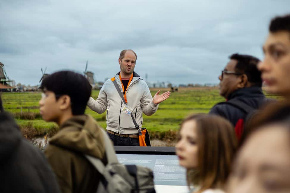 Amsterdam: Zaanse Schans windmills & Volendam Guided Tour - The hidden value: a good guide makes the photos better