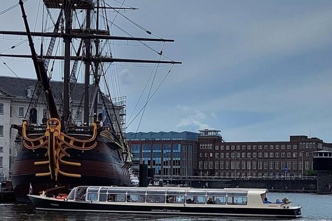 Discover Amsterdam: Luxury Canal Cruise with a Local Skipper - Bridges, waterfront houses, and the skinny-bridge moment