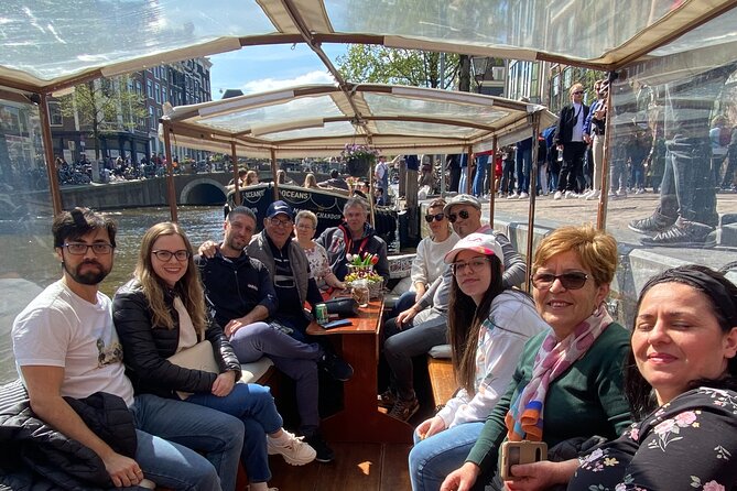 Dutch Cheese & Drinks Guided Amsterdam Boat Tour, All Inclusive - From Neo-Renaissance station views to shipyard-era architecture