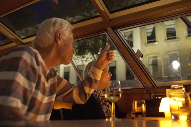 Evening Canal Cruise in Amsterdam with Wine & Cheese Option - Audio instead of live guiding: what the headsets do well (and where they can fail)