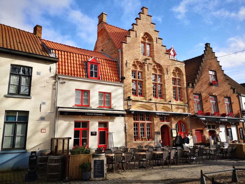 From Amsterdam: Bruges Day Trip in English with Boat Option - Burg Square, Holy Blood Basilica, and Gruuthuse Palace