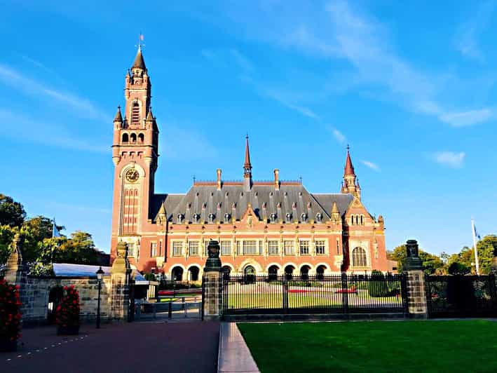 From Amsterdam: Day Tour to Rotterdam, Delft and The Hague - Delft City Square time plus guided landmarks