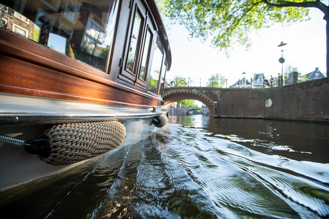 Private Boat Tour Amsterdam - 90 Min incl. welcome drink on historic saloon boat - Where You Start: Oosterdokskade 8 and a Smooth Return