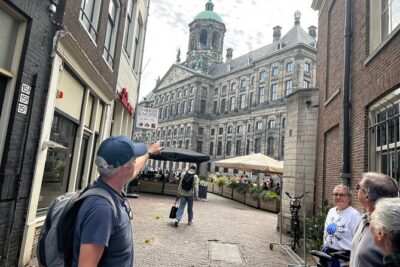 Small Group Walking Tour in Amsterdam with Friendly and Fun Guide - Starting at Dam Square: the 15-minute orientation you’ll use all trip