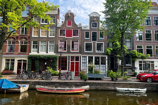 Small Group Walking Tour in Amsterdam with Friendly and Fun Guide - Jordaan and the Old Center: moving from classic icons to quieter city life