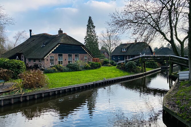 Zaanse Schans and Giethoorn Small-Group Tour with Hotel Pick-Up - Kooijman clogs workshop: live wooden shoe making and try-on fun