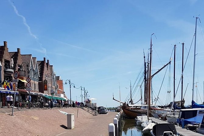 Zaanse Schans and Volendam Private Tour – Clogs, Cheese and More - Volendam waterfront: the dike, the harbor, and fresh fish options